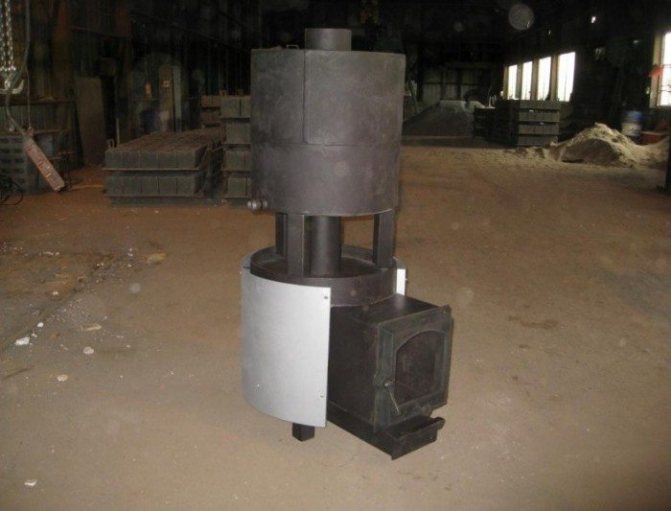 Cast iron stove with a tank.