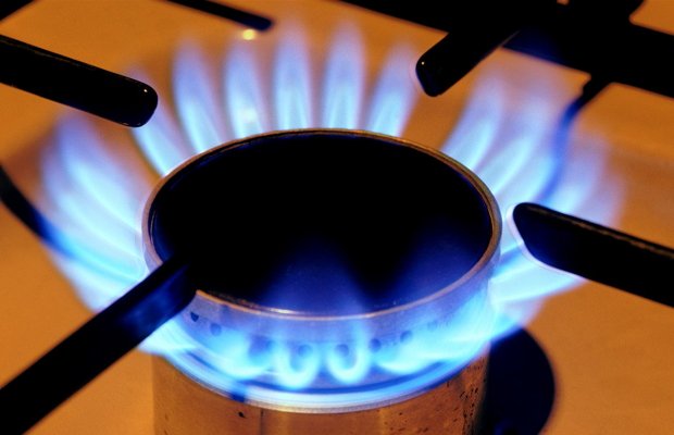 Blue flame of gas on a kitchen stove