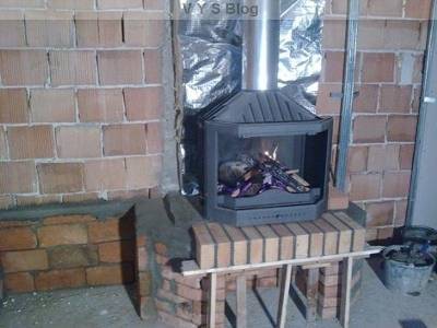 How to install a fireplace stove in a wooden house