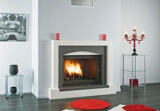 The picture shows a fireplace with a closed firebox