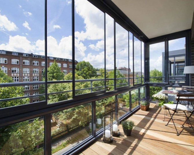 Panoramic glazing of a balcony: types and features of technology