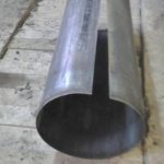 Giving the sheet metal a cylindrical shape