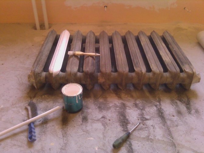 Proses mengecat radiator pemanasan