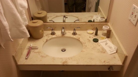 sinks in the bathroom with a cabinet dimensions