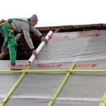 Laying a vapor barrier