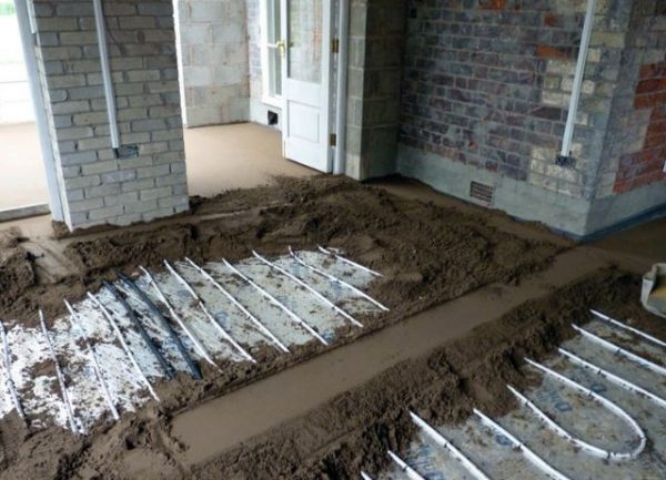 Laying underfloor heating in a screed - step-by-step technology for water and electric floors