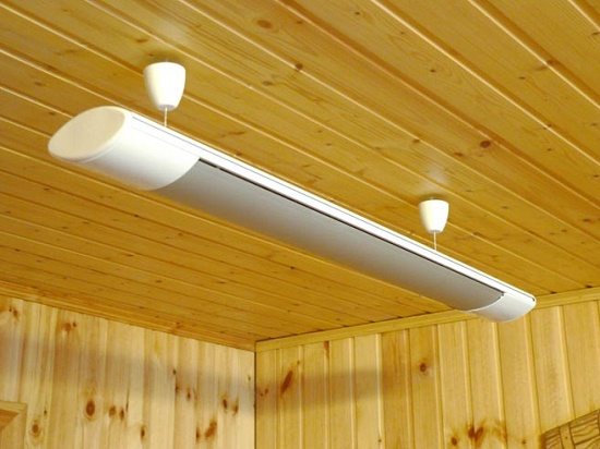 Installation of an infrared heater on the ceiling of a loggia