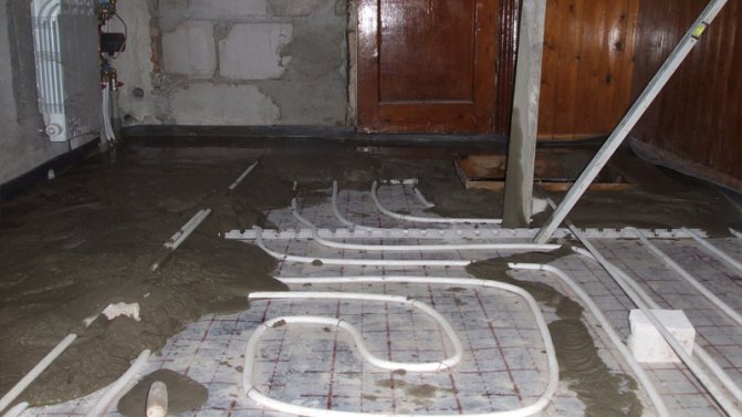 installation of a water-heated floor in a private house - filling