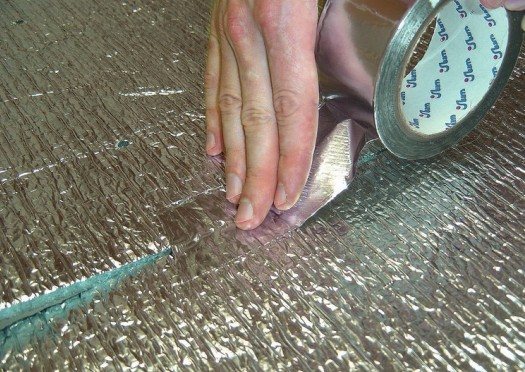 floor insulation with penofol in a wooden house