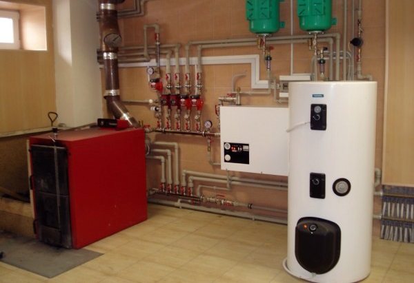 An additional indirect heating boiler can be located in the boiler room