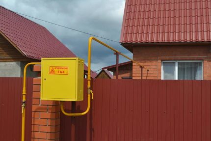 Box with a gas meter near the house